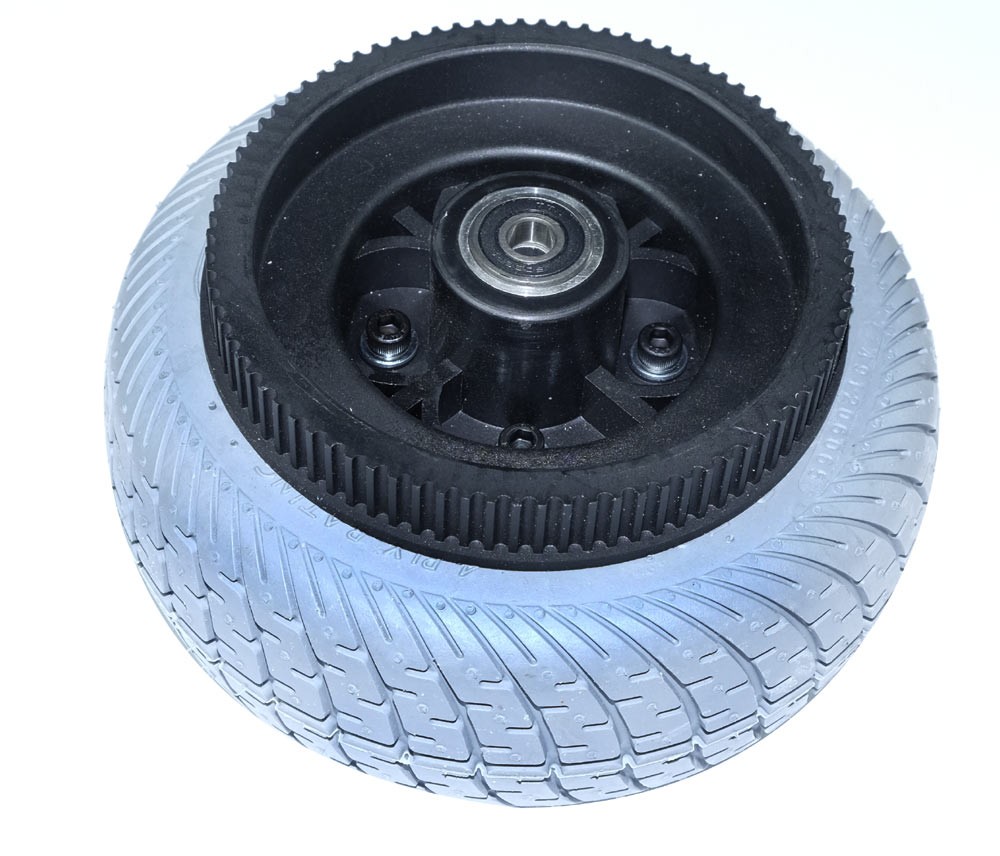 Rear tire left side with pinion for belt